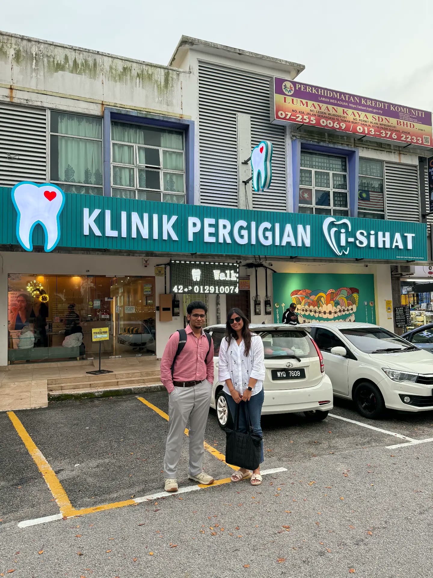 The tribe outside a partner dental clinic in Malaysia